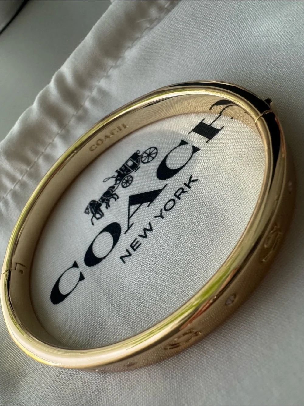 Coach Gold Tone Signature C Logo Bangle Bracelet